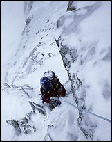 Frank Levy during a storm,  North face of Les Droites,  Mont-Blanc Range, Alps, France.  ( color)