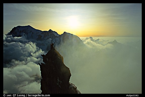 On the very narrow top of Dent du Geant, Mont-Blanc Range, Alps, France.  (color)