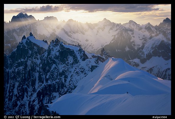 Alpinists on the Aiguille du Midi ridge. Alps, France