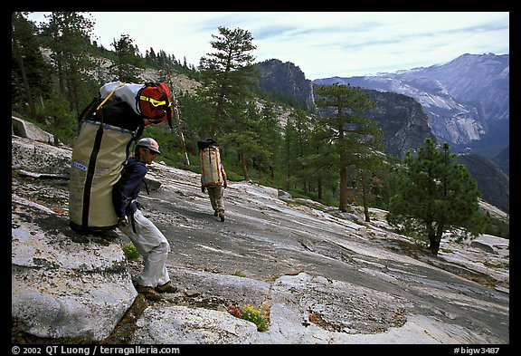 Taking a break while going down the east ledges. El Capitan, Yosemite, California (color)