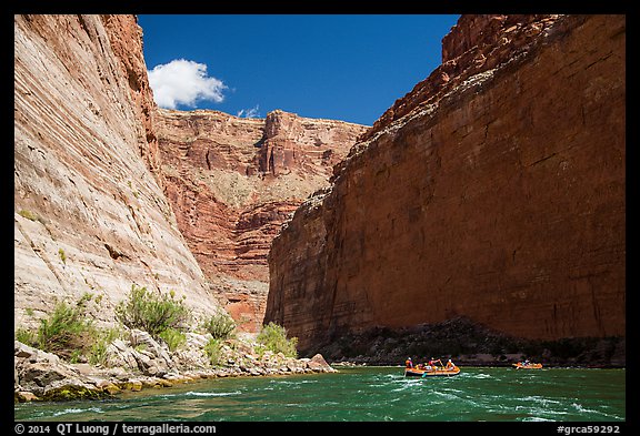 Rafts dwarfed by huge Redwall limestone canyon walls. Grand Canyon National Park, Arizona
