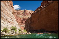 Rafts dwarfed by huge Redwall limestone canyon walls. Grand Canyon National Park, Arizona