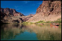Oar-powered rafts and cliff reflections. Grand Canyon National Park, Arizona