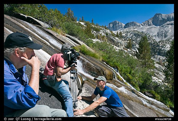 Crew filming a waterfall, lower Dusy Basin. Kings Canyon National Park, California