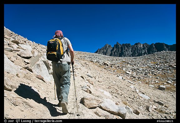 Hiker heading towards Biship Pass, Dusy Basin. Kings Canyon National Park, California (color)