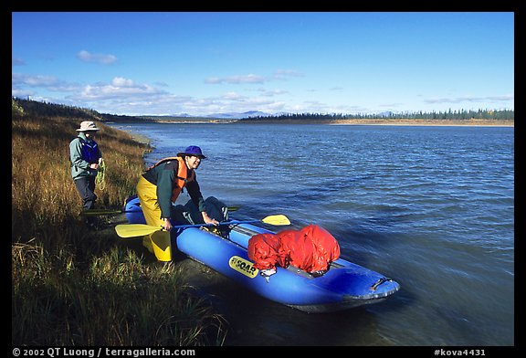Canoeists prepare to lauch on the Kobuk River. Kobuk Valley National Park, Alaska