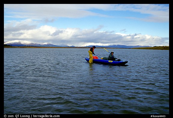 Canoeists on a wide and very shallow stretch of the Kobuk River. Kobuk Valley National Park, Alaska