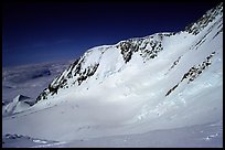 I leave by myself the camp for a summit attempt, taking a cut-off to the West Rib. The West Buttress route goes to the pass, through the steep wall, and is quite crowded. Denali, Alaska