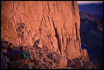 Climbers on a bivy ledge in the East face of Mt Whitney. California
