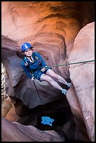 Woman at the start of free hanging rappel in Pine Creek Canyon. Zion National Park, Utah ( color)
