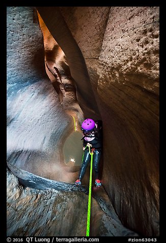 Rappeling into the depths of Keyhole Canyon. Zion National Park, Utah (color)