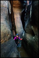 Canyoneer in tight and wet section of Das Boot Canyon. Zion National Park, Utah ( color)
