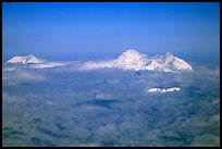 Mt Foraker and Mt McKinley emerging from a sea of clouds. Denali National Park, Alaska, USA.