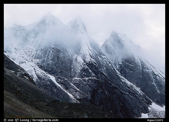 The Maidens with fresh show and a thin veil of clouds. Gates of the Arctic National Park (color)