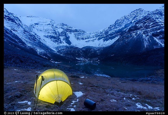 Lighted tent, lake, and Three River Mountain. Gates of the Arctic National Park (color)