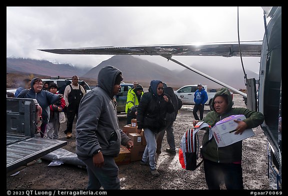 Unloading airplane, Anaktuvuk Pass Airport. Gates of the Arctic National Park (color)