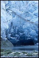 Ice cave at the base of Lamplugh glacier. Glacier Bay National Park, Alaska, USA.