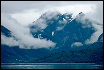 Peaks and low rain clouds. Glacier Bay National Park, Alaska, USA.