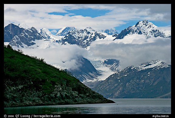 Peaks of Fairweather range with clearing clouds. Glacier Bay National Park, Alaska, USA.