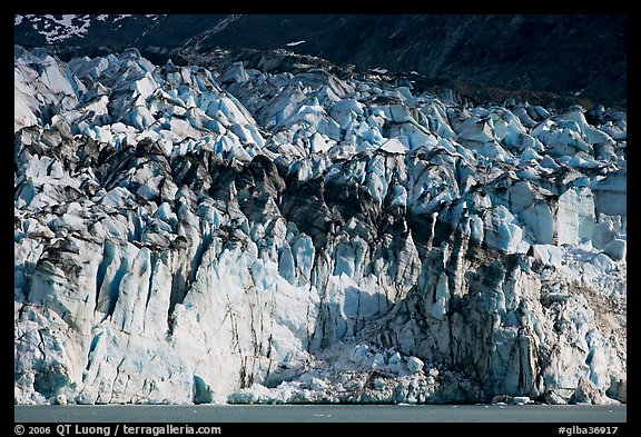 Tidewater ice front of Lamplugh glacier. Glacier Bay National Park, Alaska, USA.