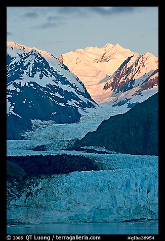 Margerie Glacier flowing from Mount Fairweather into the Tarr Inlet, sunrise. Glacier Bay National Park, Alaska, USA.