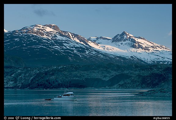 Small boat in Tarr Inlet, early morning. Glacier Bay National Park, Alaska, USA.
