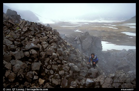 Climbing into the Novaropta crater, where fumeroles are still present, Valley of Ten Thousand smokes. Katmai National Park, Alaska (color)