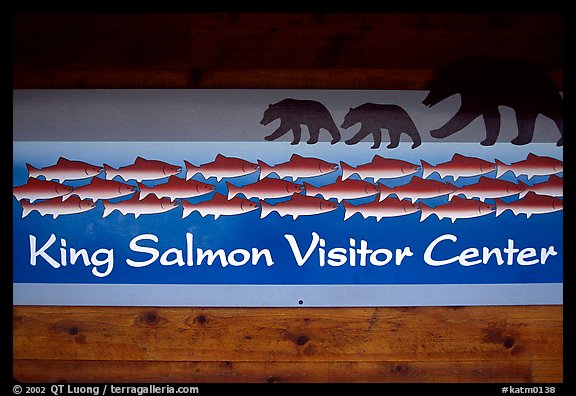 Bears and salmon on visitor center sign. Katmai National Park, Alaska, USA.