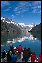 Mountains reflected in fjord, seen by tour boat passengers, Northwestern Fjord. Kenai Fjords National Park, Alaska, USA. (color)