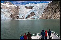 People looking at Northwestern glacier from deck of boat, Northwestern Fjord. Kenai Fjords National Park, Alaska, USA. (color)