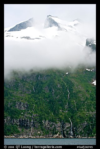 Cloud-covered peak and waterfalls, Northwestern Fjord. Kenai Fjords National Park, Alaska, USA.
