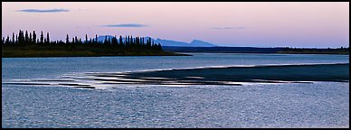 River landscape with ripples on water at dusk. Kobuk Valley National Park (Panoramic color)