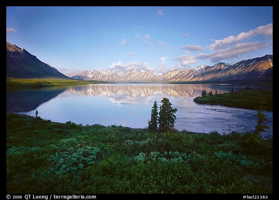 Twin Lakes with mountain reflections and green tundra, evening. Lake Clark National Park, Alaska, USA.