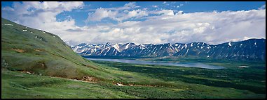 Verdant tundra landscape in the summer with lake and mountains. Lake Clark National Park (Panoramic color)