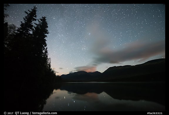 Starry sky above Kontrashibuna Lake. Lake Clark National Park, Alaska, USA.