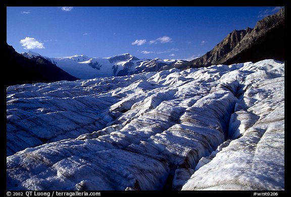 Crevasses on Root glacier, Wrangell mountains in the background, late afternoon. Wrangell-St Elias National Park, Alaska, USA.