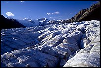 Crevasses on Root glacier, Wrangell mountains in the background, late afternoon. Wrangell-St Elias National Park, Alaska, USA.