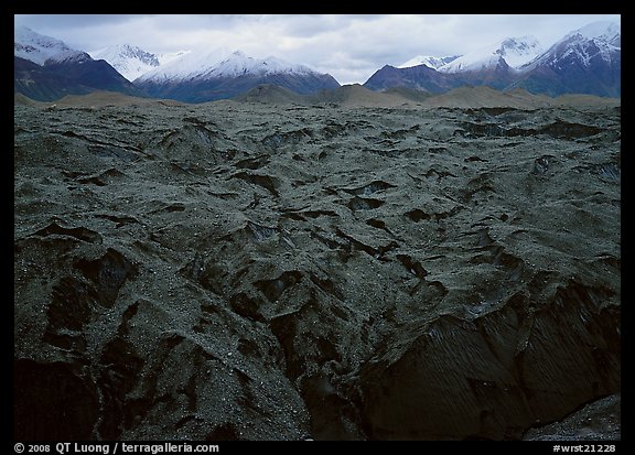 Glacier covered with black rocks. Wrangell-St Elias National Park, Alaska, USA.