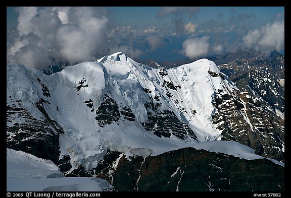 Aerial view of peak with seracs and hanging glaciers, University Range. Wrangell-St Elias National Park, Alaska, USA.