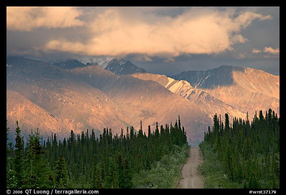 Road and Nutzotin Mountains at sunset. Wrangell-St Elias National Park, Alaska, USA.