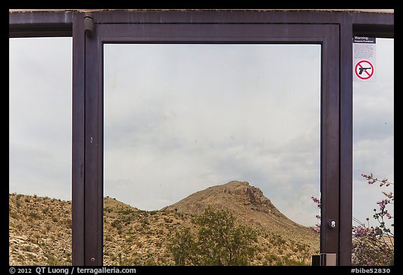 Santiago mountains, Persimmon Gap Visitor Center window reflexion. Big Bend National Park, Texas, USA.