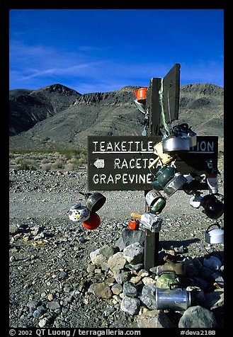 Teakettle Junction sign, adorned with teakettles. Death Valley National Park, California, USA.