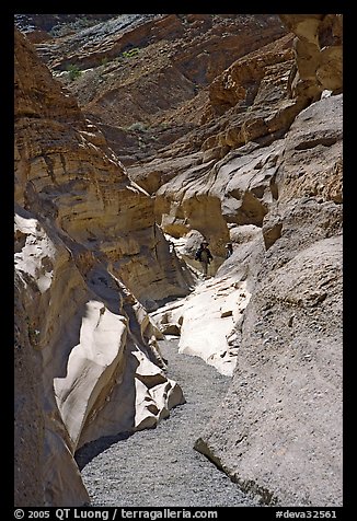 Hikers in slot, Mosaic canyon. Death Valley National Park (color)