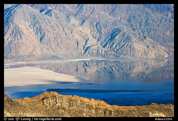 Rare seasonal lake on Death Valley floor and Black range, seen from above, late afternoon. Death Valley National Park, California, USA.