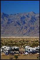 Camp and RVs at Stovepipe Wells, with Armagosa Mountains in the background. Death Valley National Park, California, USA.
