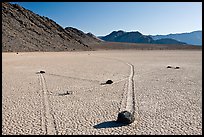 Moving rocks and non-linear tracks, the Racetrack. Death Valley National Park, California, USA. (color)