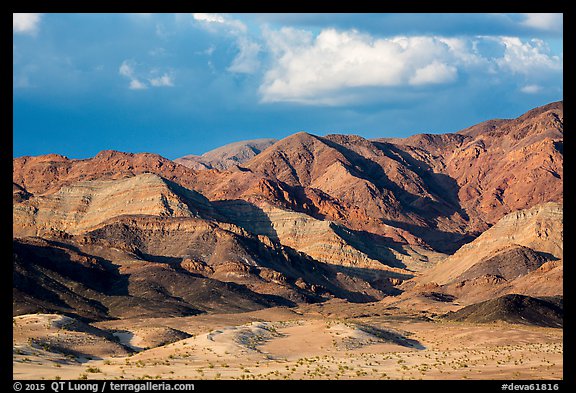Distant Ibex Dunes at the base of multicolored mountains. Death Valley National Park (color)