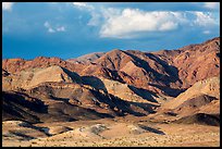 Distant Ibex Dunes at the base of multicolored mountains. Death Valley National Park ( color)