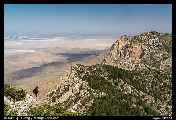 Park visitor looking, Guadalupe Peak. Guadalupe Mountains National Park, Texas, USA.