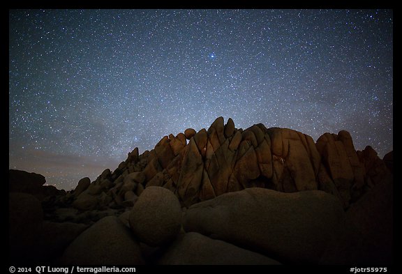 Geometrically shaped rocks and clear starry sky. Joshua Tree National Park, California, USA.